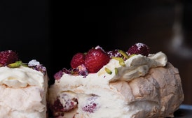 Meringue Roulade with Rose Petals and Fresh Raspberries
