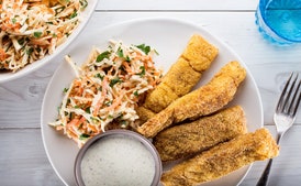 Old Bay–Spiced Fish Sticks with Creamy Celery Root and Carrot Slaw