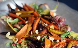 Roasted and Raw Carrot Salad with Hazelnuts and Arugula